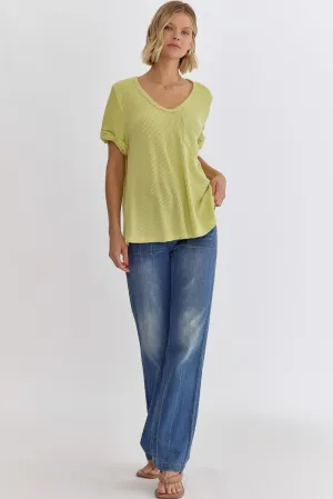 Erica V-neck short sleeve top featuring rolled sleeve hem and pocket at bust In Lime