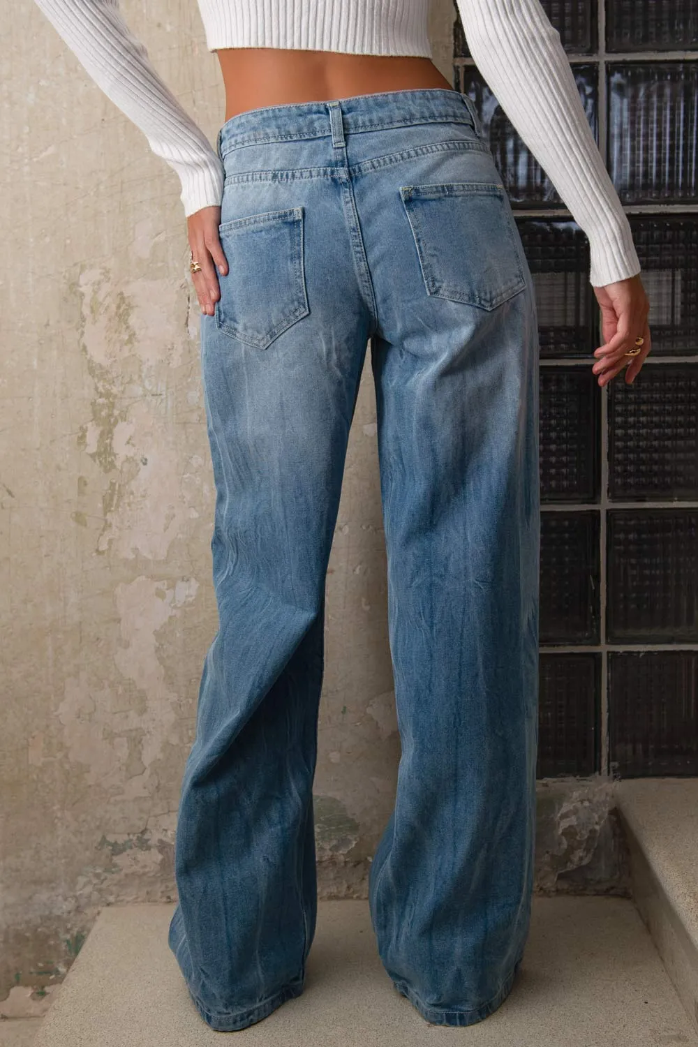Pantalón de denim fit wide leg cintura media