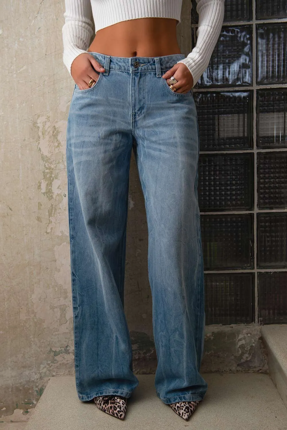 Pantalón de denim fit wide leg cintura media